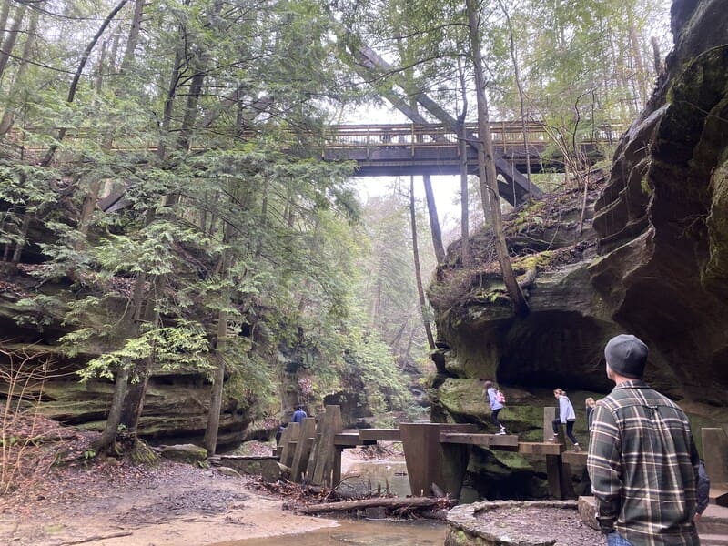 Group of people hiking in Hocking Hills in Spring